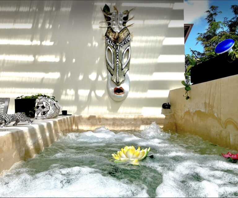 Jacuzzi with flowers at Villa Zen